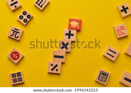 Red graduation cap with math symbols isolated on yellow background. I love math concept.