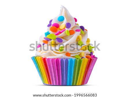 Birthday cupcake. Rainbow Cup Liners. Happy Birthday. LGBT pride. Tasty baking cupcakes, cake or muffin with white cream icing, frosting, bright colored sprinkles, candy. White isolated background. Royalty-Free Stock Photo #1996566083