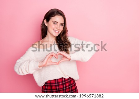 Photo of young attractive girl happy positive smile show fingers heart symbol love feelings isolated over pastel color background