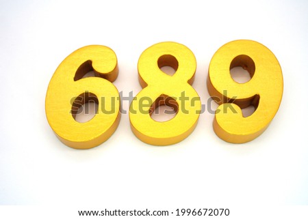     Arabic numerals 689 gold on white background                            