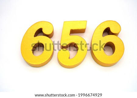  Arabic numerals 656 gold on white background                               