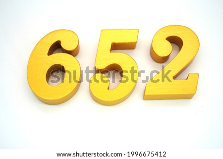  Arabic numerals 652 gold on white background                               