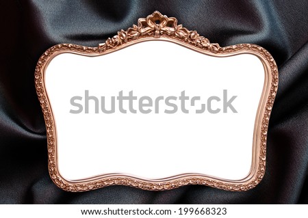 Antique frame with blank copy space, black fabric background