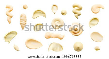 Mayonnaise drop and splash sets. White sause isolated stain top view. Elements for design in food or cosmetic sphere. High resolution photo.