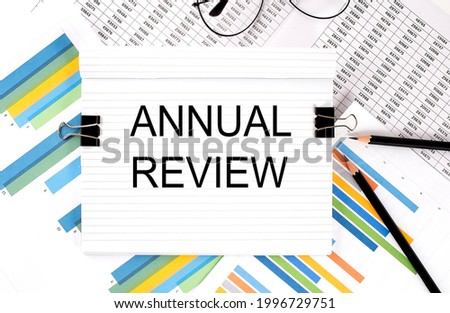 ANNUAL REVIEW , text on the chart , office supplies, business