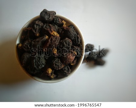Dried Fruits of Gambhari (Gmelina arborea) commonly known as Chandahara tree, Goomer teak is a small to medium tree belonging to family verbenaceae. Used in medicine in ayurveda therapies.
 Royalty-Free Stock Photo #1996765547