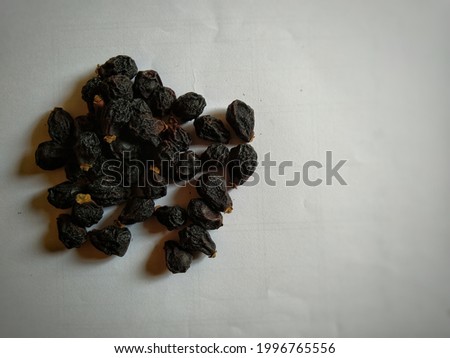 Dried Fruits of Gambhari (Gmelina arborea) commonly known as Chandahara tree, Goomer teak is a small to medium tree belonging to family verbenaceae. Used in medicine in ayurveda therapies.
 Royalty-Free Stock Photo #1996765556