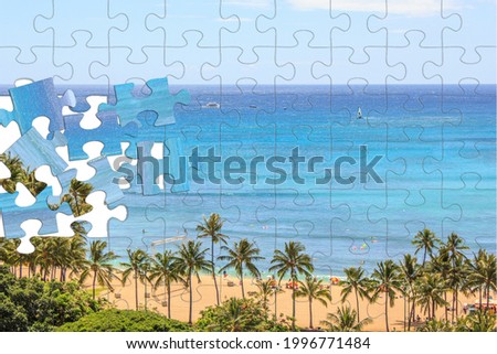 A jigsaw puzzle effect, aerial view photo of the famous Waikiki Beach in Honolulu, Oahu, Hawaii.
