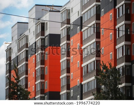 Apartment building. Contemporary architecture. Multistory building.  Royalty-Free Stock Photo #1996774220