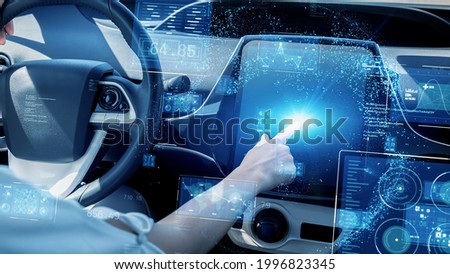 Cockpit of futuristic car concept. Autonomous car. Self driving vehicle. Autopilot. Royalty-Free Stock Photo #1996823345