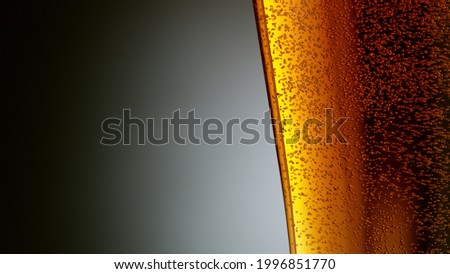 Close-up of beer pint with free space for text. Abstract beverages background.
