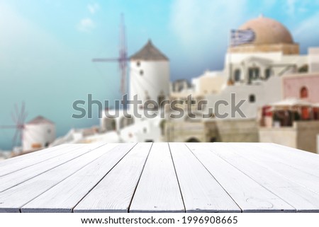 Table background of free space for your decoration and summer landscape of Greece 