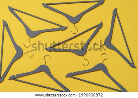 flat lay of new clothes hangers on the table