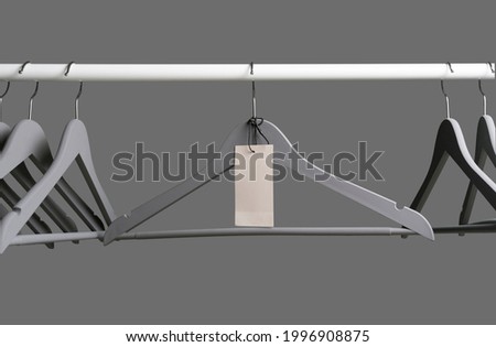 mockup template of clothes hangers with a blank price tag label copy space