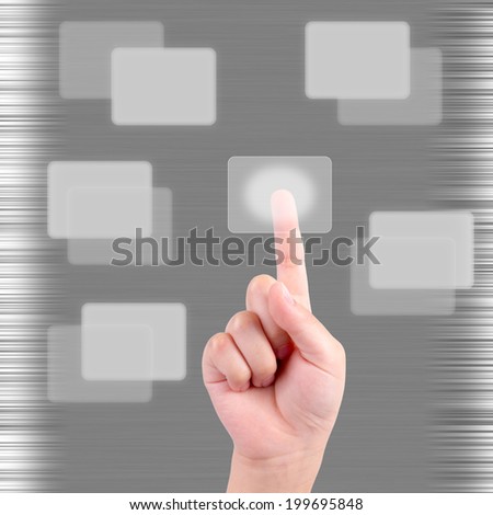 child hand pressing a touchscreen button