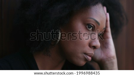 Preoccupied African woman. Pensive stressed black person feeling anxiety.jpeg
