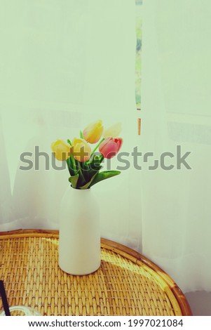 2 October 2020 ; Bangkok Thailand : Colorful tulips flower in vase.