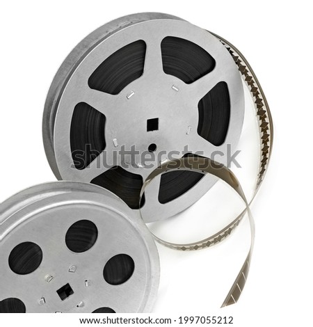 Film reels isolated on white background. Retro equipment for cinema production.