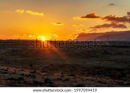sunset on mountains in salalah