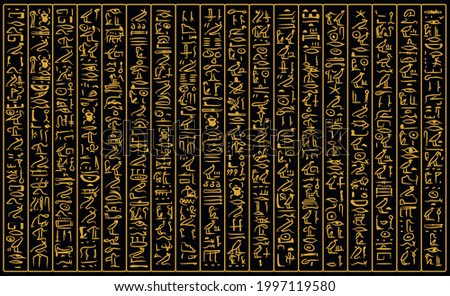 Ancient golden egyptian hieroglyphs alphabet pattern over black background. Ancient egyptian and ancient culture concept Royalty-Free Stock Photo #1997119580