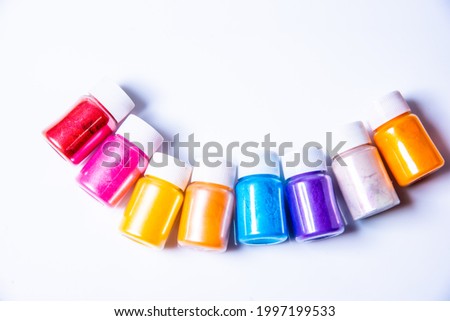 pearl powder in bottles quality mica powder color in bottles on white technology mica powder Royalty-Free Stock Photo #1997199533
