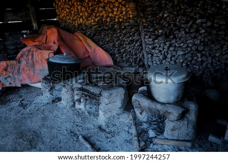 Traditional kitchen for cooking. Cooking with wood