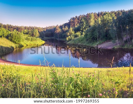 Moscow. June 19, 2021. Nice summer landscape in Meshchersky park. Great view of the pond in the evening.