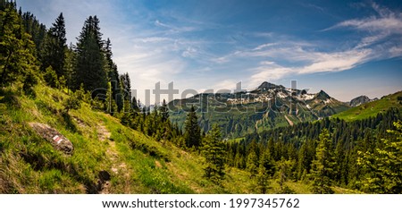 Beautiful mountain hike near Damuels along the Hochblanken ridge in Vorarlberg, Austria Royalty-Free Stock Photo #1997345762