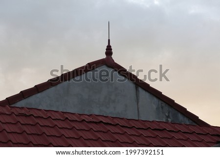 lightning rod or lightning conductor on the roof of building for protection lightning from thunder.