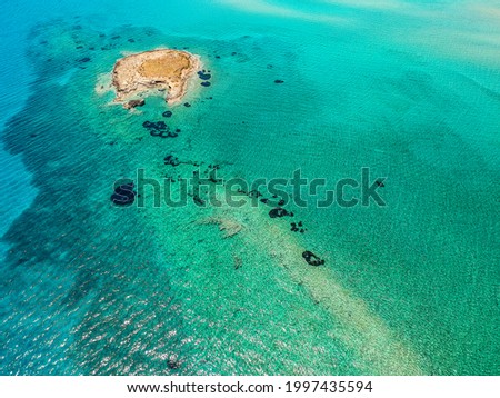 Iconic aerial view over Pounda beach at the famous sunken ancient city of Pavlopetri in Laconia, Greece