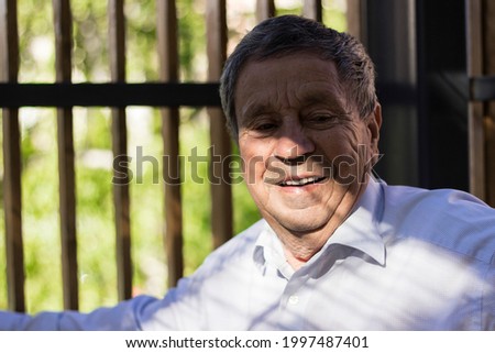 Portrait of active senior man smiling