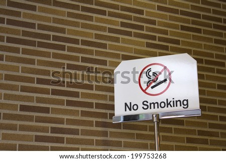 No-Smoking Sign In Front Of The Building Entrance