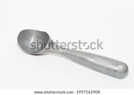Empty vintage ice cream scoop isolated on white background with copy space 
