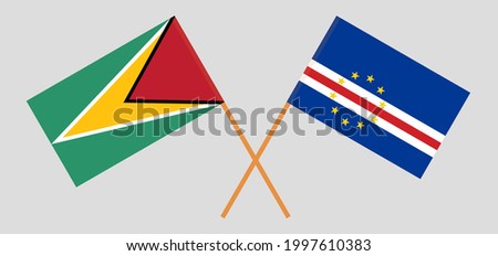 Crossed flags of Guyana and Cape Verde. Official colors. Correct proportion
