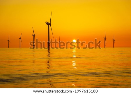 Beautiful sun set in the North Sea Royalty-Free Stock Photo #1997615180