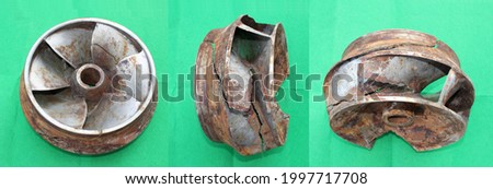 Damage to the pump impeller due to cavitation Royalty-Free Stock Photo #1997717708