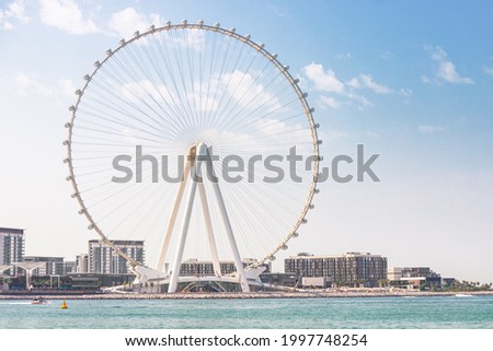 One of the largest Ferris Wheels in the World is the Dubai Ain on bluewaters island. Top tourist attractions in the United Arab Emirates Royalty-Free Stock Photo #1997748254