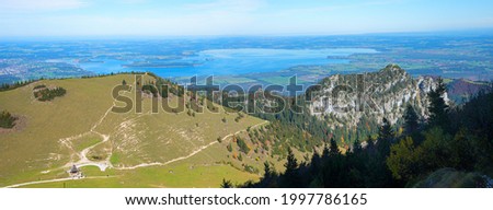 view from kampenwand mountain to lake chiemsee and alpine foothills, upper bavarian landscape Royalty-Free Stock Photo #1997786165