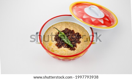 traditional saudi arabia food, groats its called in arabic jareesh, , traditional plate in central region najd Royalty-Free Stock Photo #1997793938