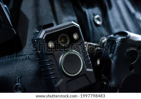 Close-up of police body camera Royalty-Free Stock Photo #1997798483