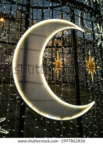 Christmas lighting detail with stars and moons lights 