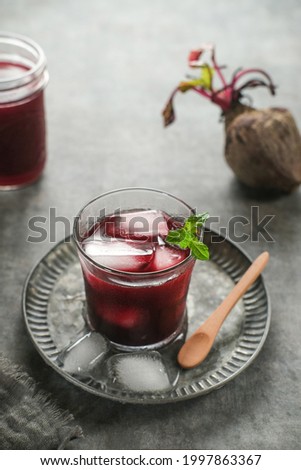 Healthy Beetroot juice, served in glass. Close up and copy space. Selective focus image, blurred backgroundd.
 Royalty-Free Stock Photo #1997863367