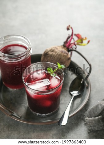 Healthy Beetroot juice, served in glass. Close up and copy space. Selective focus image, blurred backgroundd.
 Royalty-Free Stock Photo #1997863403