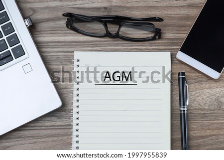 AGM - acronym for Annual General Meeting.  Business concept Royalty-Free Stock Photo #1997955839