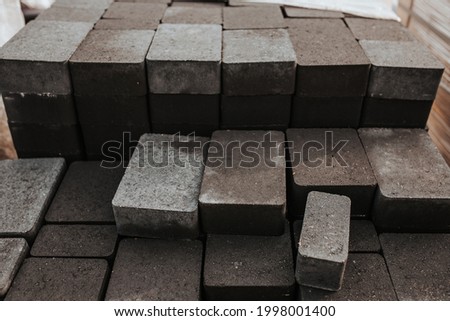 Pallet with paving slabs at a construction site - paving stones
