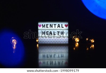 Mental health writing on light box