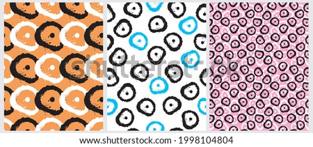 Simple Abstract Geometric Print with Irregular Circles and Dots on a Pink, White ann Orange Background. Hand Drawn Seamless Vector Pattern with Black, White and Blue Spots. Modern Design.