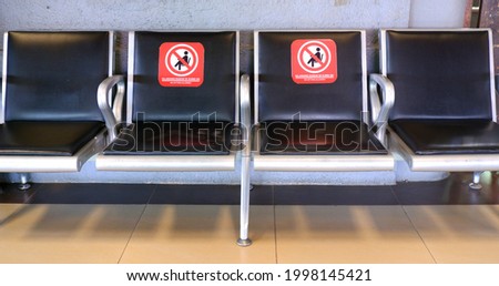 social distancing chair in trainstation  a new normal concept during pandemic corona virus to keep safety
