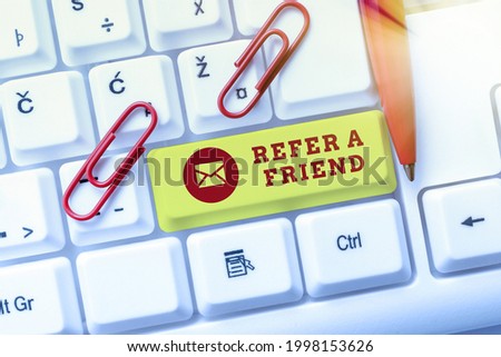 Conceptual caption Refer A Friend. Conceptual photo direct someone to another or send him something like gift Typing Online Network Protocols, Creating New Firewall Program
