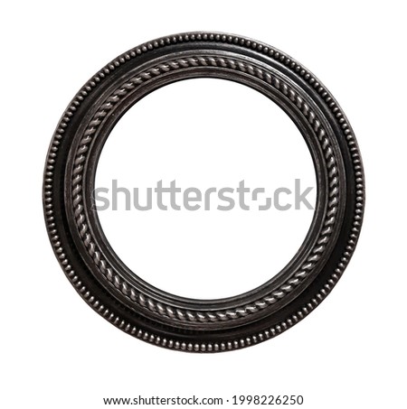 There is a round bronze frame. White background. Isolated.